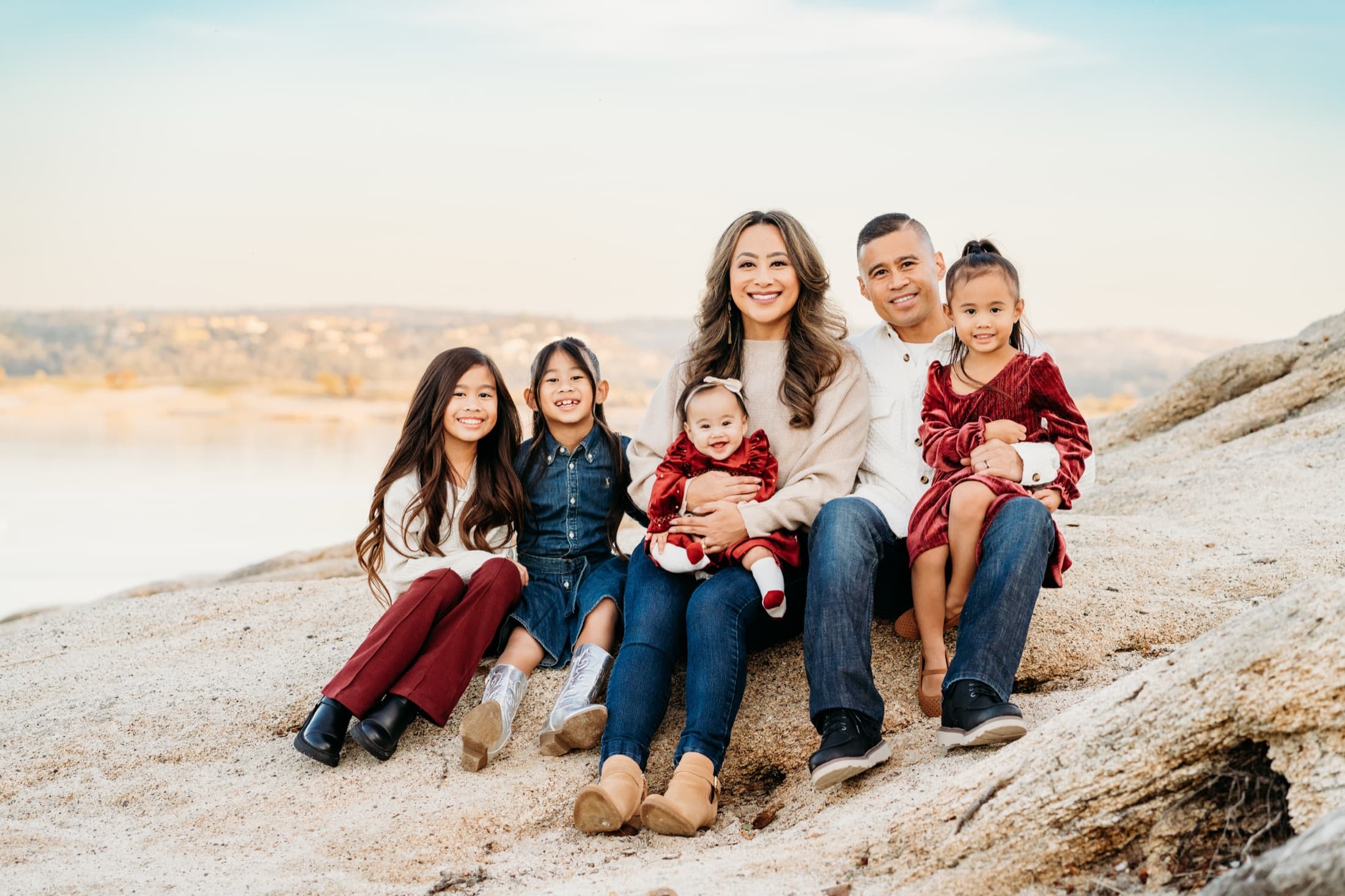 Family at the beach at sunset